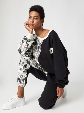 florence by mills exclusive for ABOUT YOU Sweatshirt 'June' in Zwart