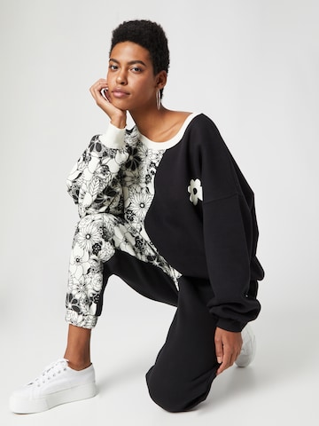 florence by mills exclusive for ABOUT YOU Sweatshirt 'June' i svart