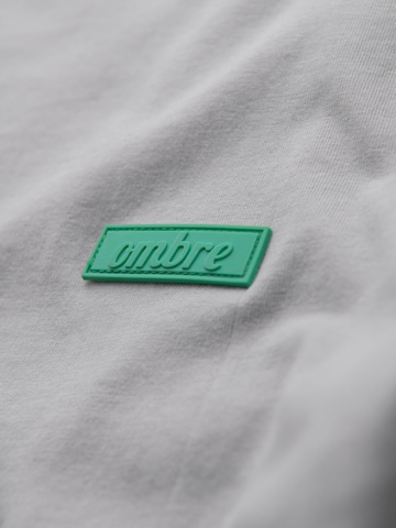 Ombre Bluser & t-shirts i grå
