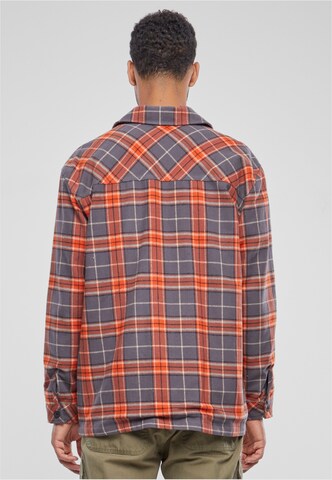 Karl Kani Regular fit Button Up Shirt in Orange