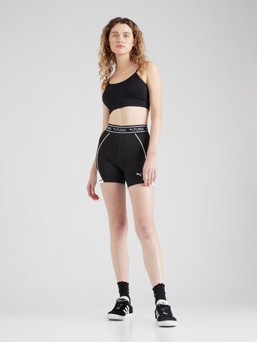 PUMA Skinny Sportsbukser 'TRAIN STRONG 5' i sort