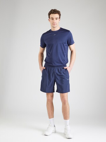regular Pantaloni sportivi 'ID TRAIN' di Reebok in blu