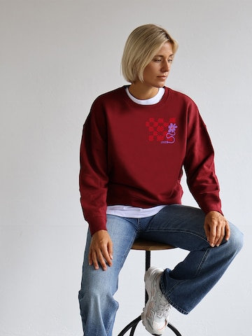 Kultgut Pullover 'Love is a Battery'‌‌‌‌‌‌‌‌ in Rot