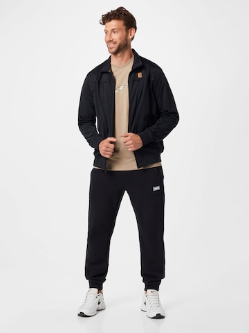 NIKE Sportjacke in Schwarz