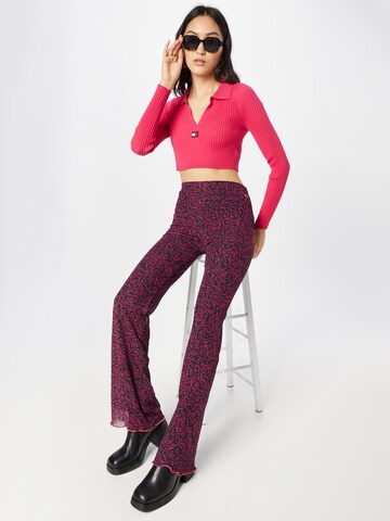 Flared Pantaloni di Tommy Jeans in rosa