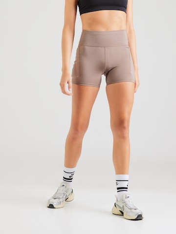 NIKE Skinny Fit Спортен панталон 'SWIFT' в кафяво: отпред