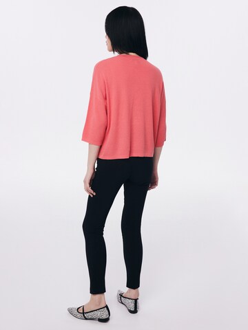 Pull-over Twist en rose