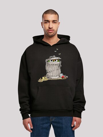 Sweat-shirt 'Sesame Street Oscar Tresh Box' F4NT4STIC en noir : devant