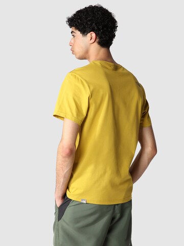 THE NORTH FACE Regularny krój Koszulka w kolorze żółty