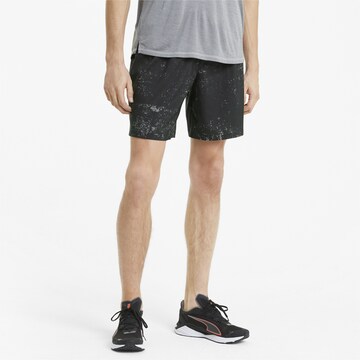 PUMA Regular Workout Pants in Black: front