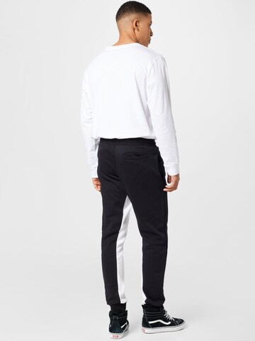 Effilé Pantalon Starter Black Label en noir
