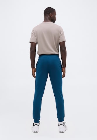 PUMA Regular Sports trousers 'ESS No. 1' in Green