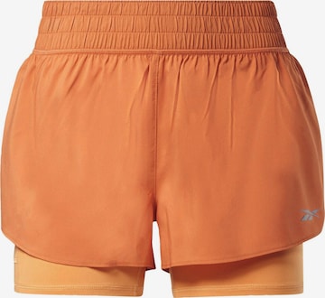 Reebok Workout Pants in Orange: front