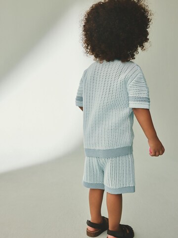 Set Next en bleu