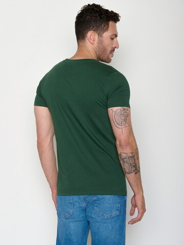 Maglietta 'Guide Nature Clouds Ride' di GREENBOMB in verde