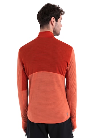 ICEBREAKER - Camisa funcionais 'Realfleece Descender' em laranja