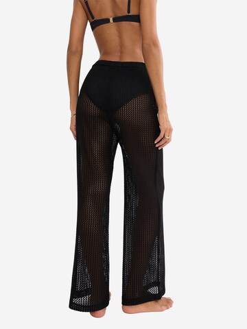 TRIUMPH Loose fit Trousers ' Red Label Beach MyWear ' in Black