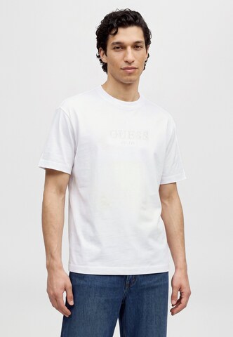 Maglietta 'ROOTS' di GUESS in bianco: frontale