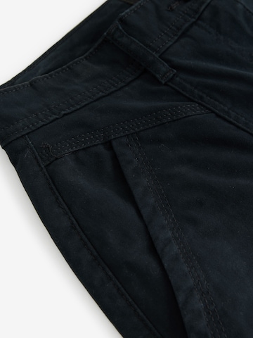 Loosefit Pantaloni chino di Next in nero