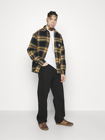 Carhartt WIP - Loosefit Calças de ganga 'Landon' em preto