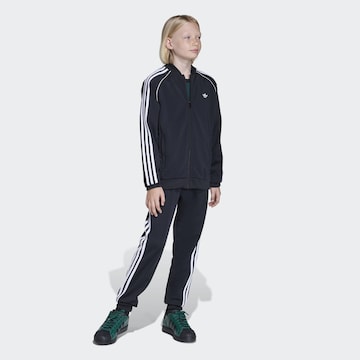 ADIDAS ORIGINALS Tapered Housut 'Sst' värissä musta