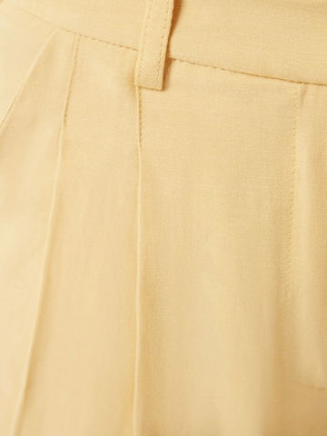 Bershka Normalny krój Spodnie w kolorze żółty