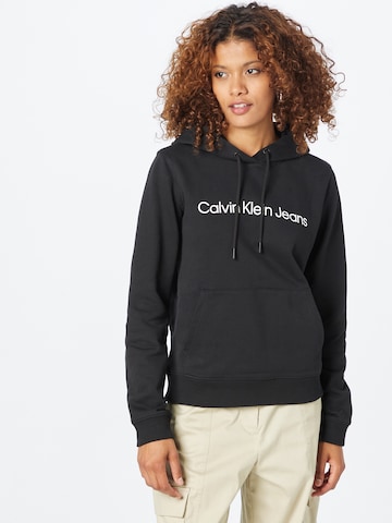 Sweat-shirt Calvin Klein Jeans en noir : devant