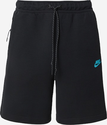 Regular Pantalon 'TCH FLC' Nike Sportswear en noir : devant
