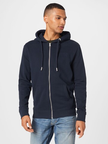 Veste de survêtement Superdry en bleu : devant