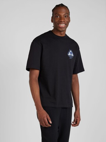 Reebok - Camiseta en negro