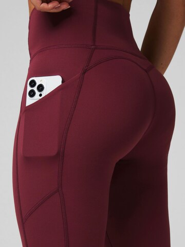 Fabletics Skinny Workout Pants 'Oasis' in Red