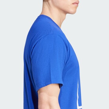 ADIDAS ORIGINALS T-Shirt 'Trefoil Torch' in Blau