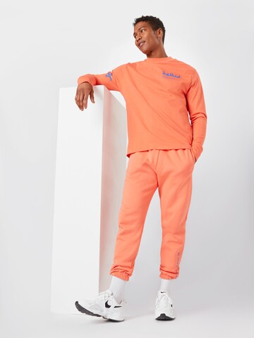 ABOUT YOU x Mero T-shirt 'Kelkid' i orange