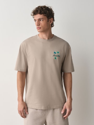 T-Shirt Next en gris