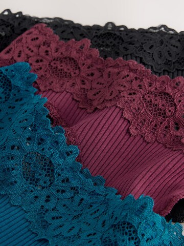 Next String in Blau