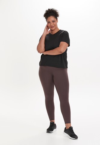 Q by Endurance Skinny Leggings in Purple