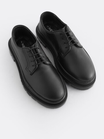 Next Flats in Black