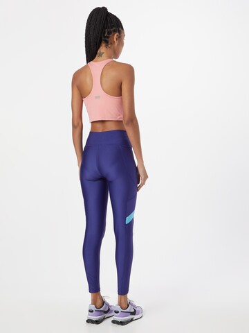 Skinny Pantaloni sportivi di UNDER ARMOUR in blu