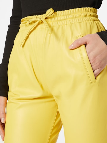 OAKWOOD Slim fit Trousers 'GIFT' in Yellow