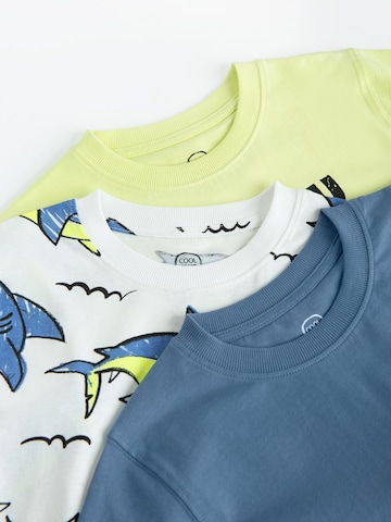 Tricou de la Cool Club pe albastru