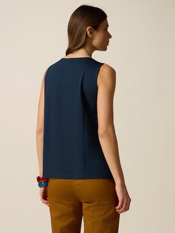Haut oltre en bleu