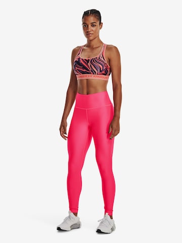 Skinny Pantaloni sportivi di UNDER ARMOUR in rosa