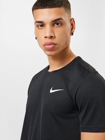 NIKE Sportshirt 'Superset' in Schwarz