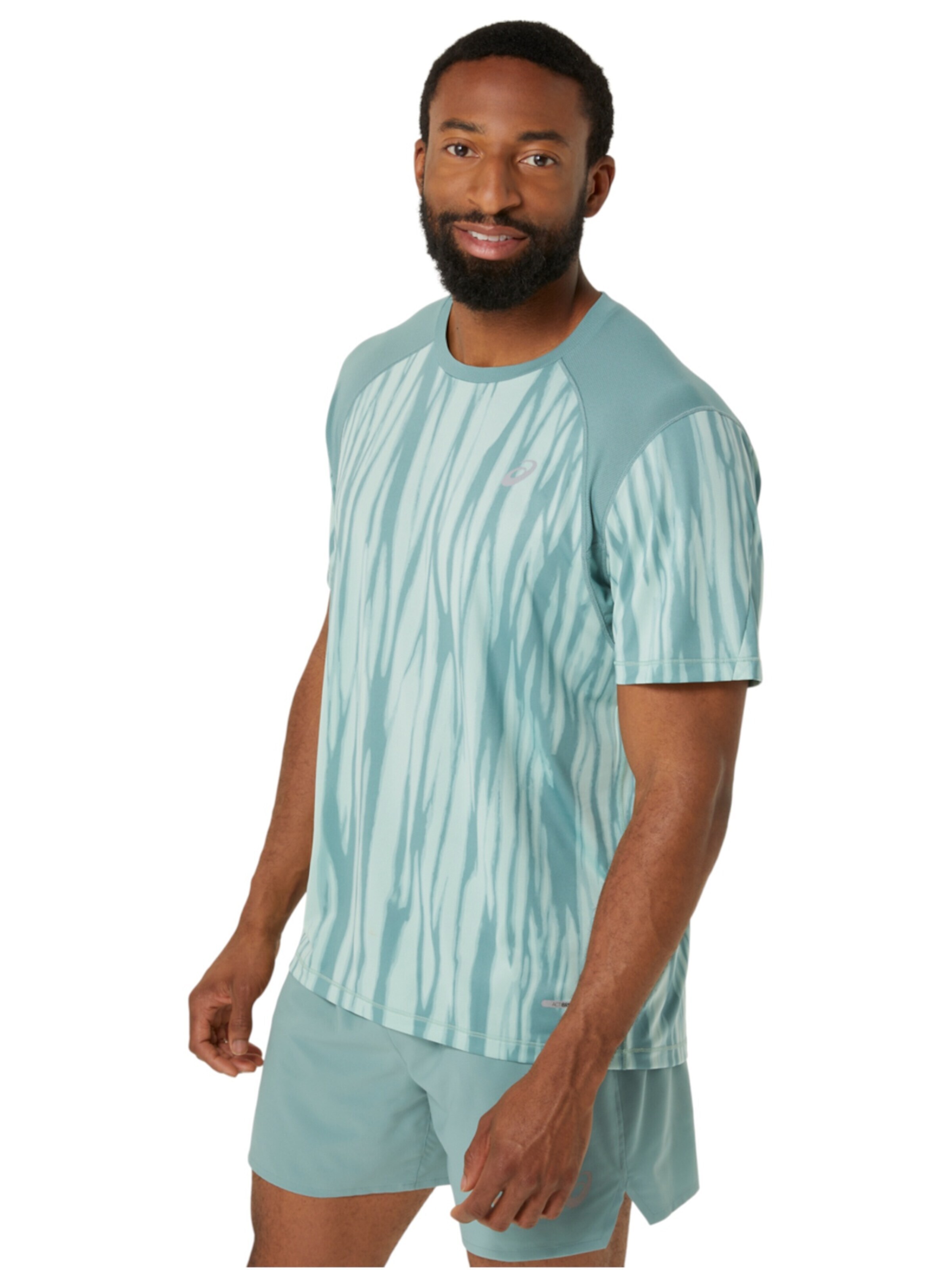 ASICS Shirt‌‌‌‌‌‌ in Grün