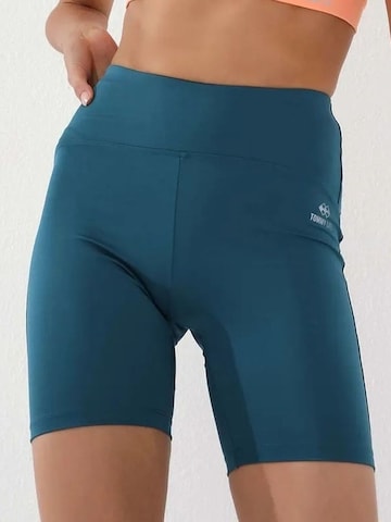 Tommy Life - Tapered Leggings 'Gamaschen' em azul: frente