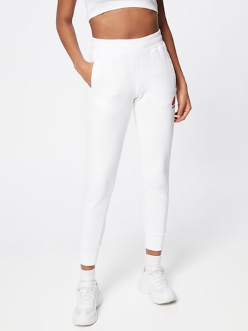 ELLESSE Tapered Pants 'QUEENSTOWN' in White: front