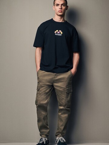 Tapered Pantaloni cargo di Next in marrone