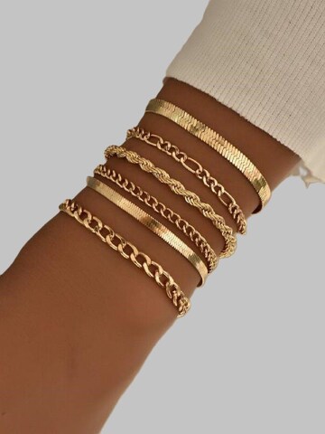 Engelsinn Jewelry Set in Gold: front