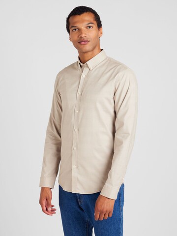 Coupe slim Chemise business Lindbergh en beige : devant