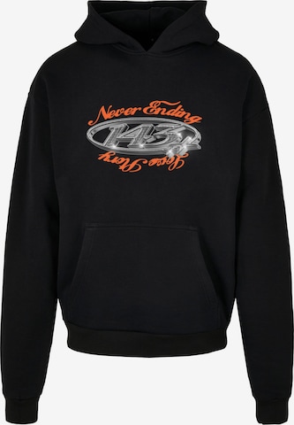 Sweat-shirt 'Never ending...' MT Upscale en noir : devant